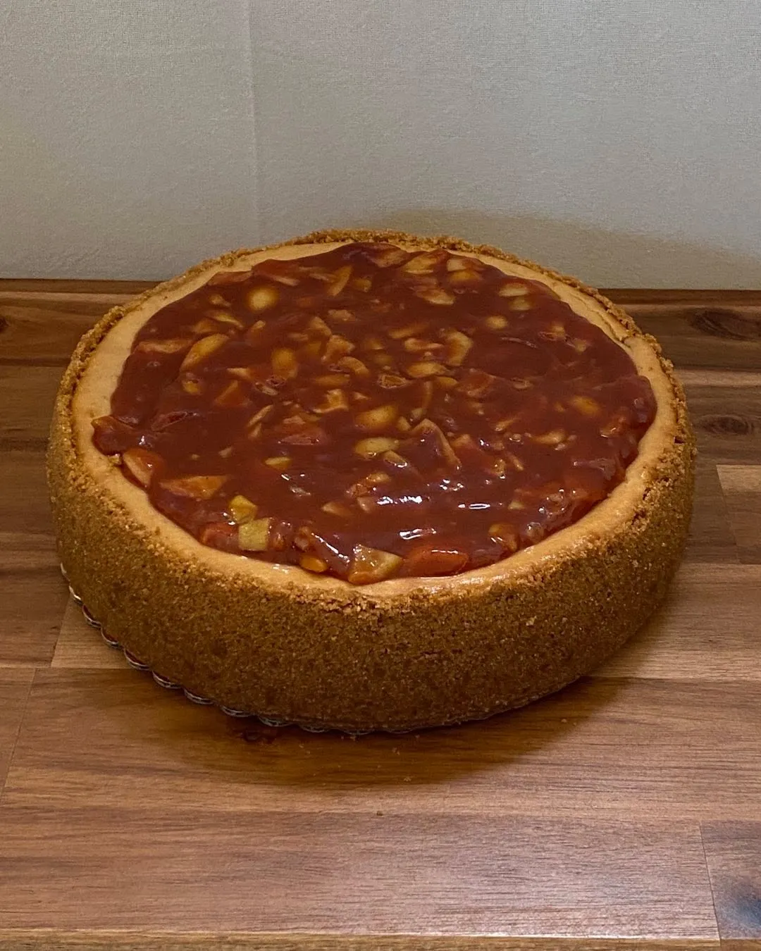 A guava cheesecake topped with guava compote.